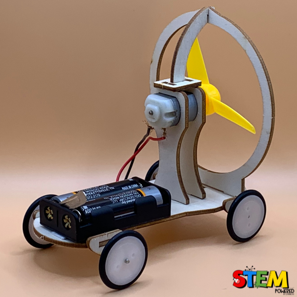 Side view of the Electric Wind Car STEM Kit, highlighting the battery pack, wooden chassis, and motorized propeller for STEM exploration.