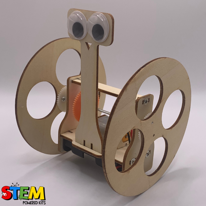 Angled view of the Balance Robot Buddy STEM Kit, showcasing its sturdy wooden structure, wheels, and functional motor system.