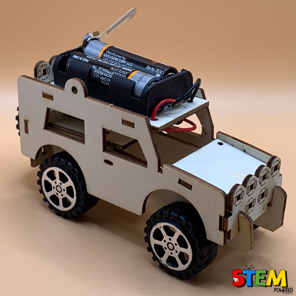 Angled top view of the Electric Wired Jeep STEM Kit, featuring a durable wooden structure, functional motor, and realistic tire design for hands-on STEM learning.