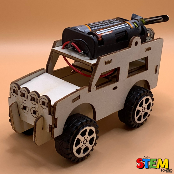 Front-side view of the assembled Electric Wired Jeep STEM Kit, showcasing the motor, battery pack, and rugged wheels for STEM exploration.