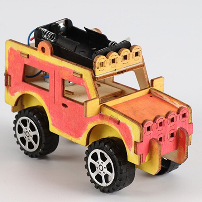 Custom-painted version of the Electric Wired Jeep STEM Kit, showing a colorful red and yellow design on the durable wooden structure.
