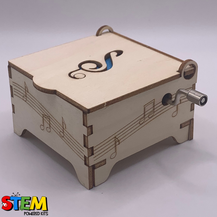 Finished Hand Crank Music Box with engraved musical notes on its sides, featuring a compact and durable wooden design for STEM learning fun