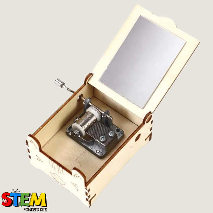 Interior view of the Hand Crank Music Box showing the mechanical components, mirror, and functional crank mechanism for playing tunes.